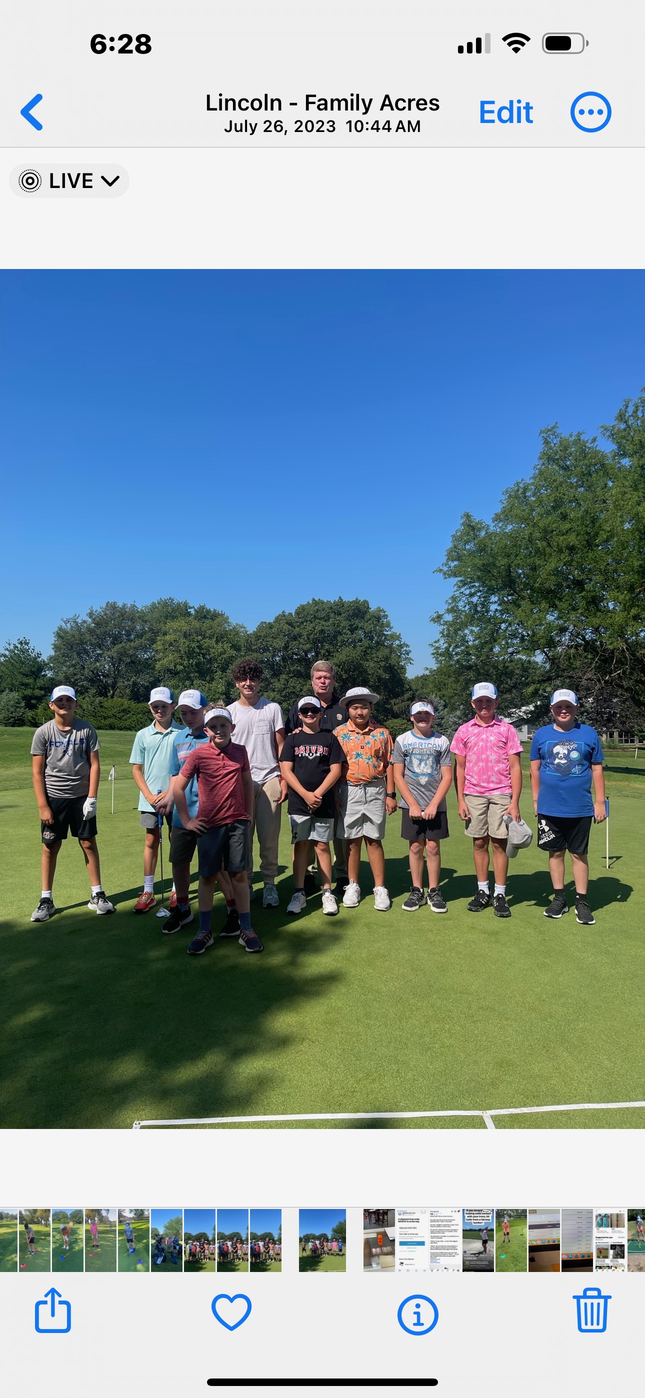 junior golfers group photo on the green